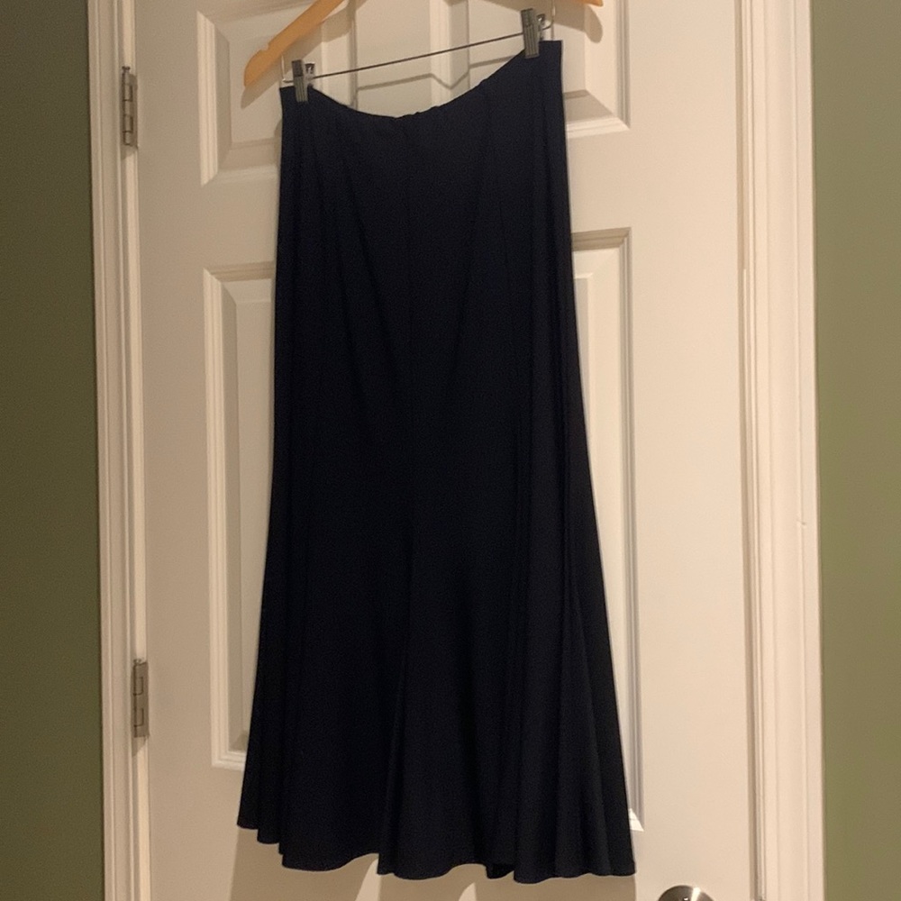 BRAND NEW Piccadilly black skirt size M. Never worn with tags. Dress up or down!